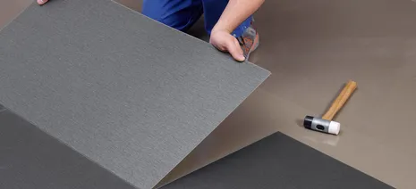 wineo Designboden Verlegetechnik Boden wird verlegt Handwerker